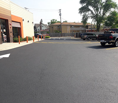 asphalt-maintenace-arlilngton-heights black pearl Asphalt Maintenance sealcoating